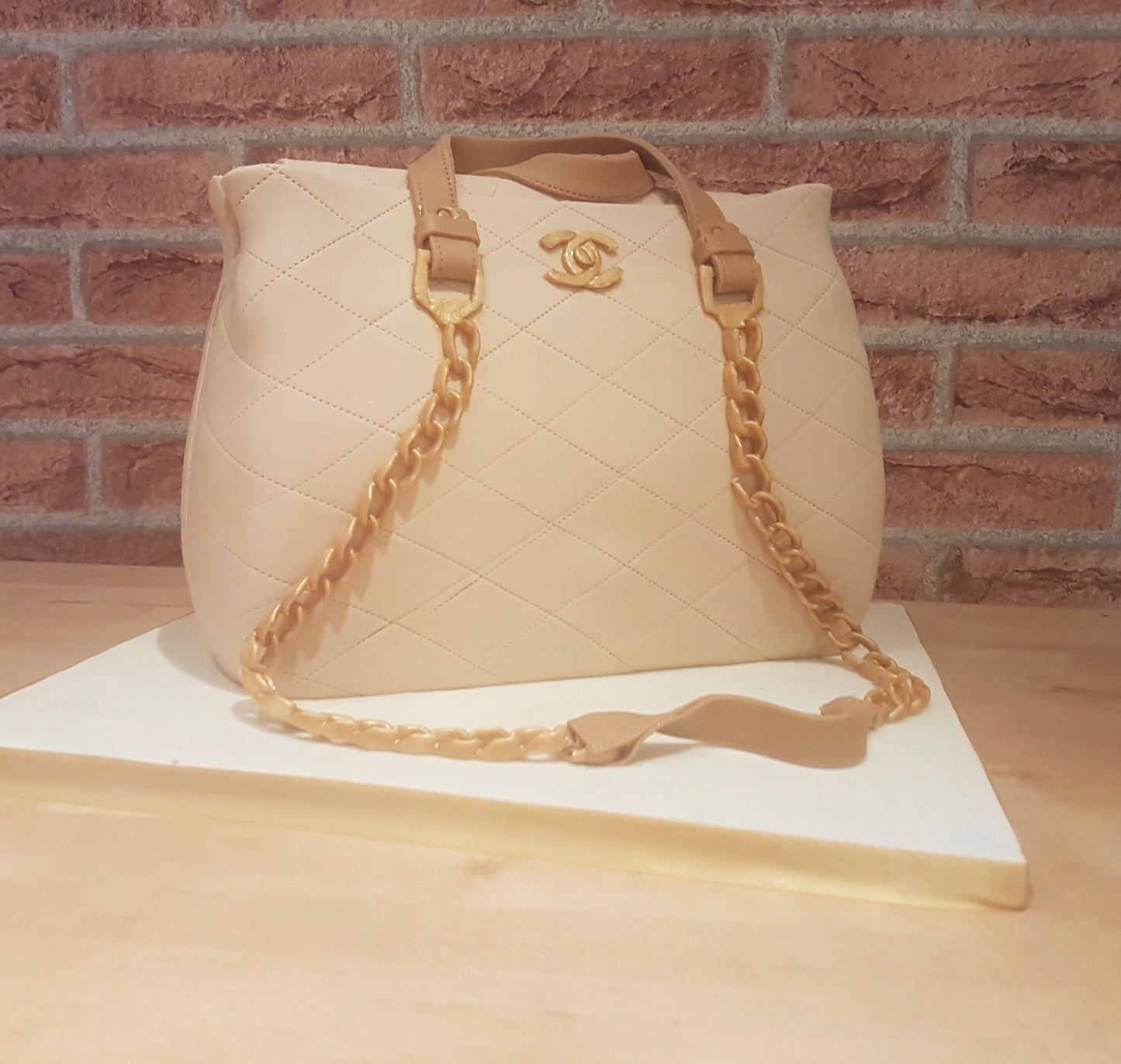 Cream Chanel bag cake