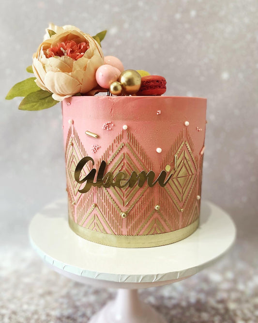 Pink and gold stencil cake