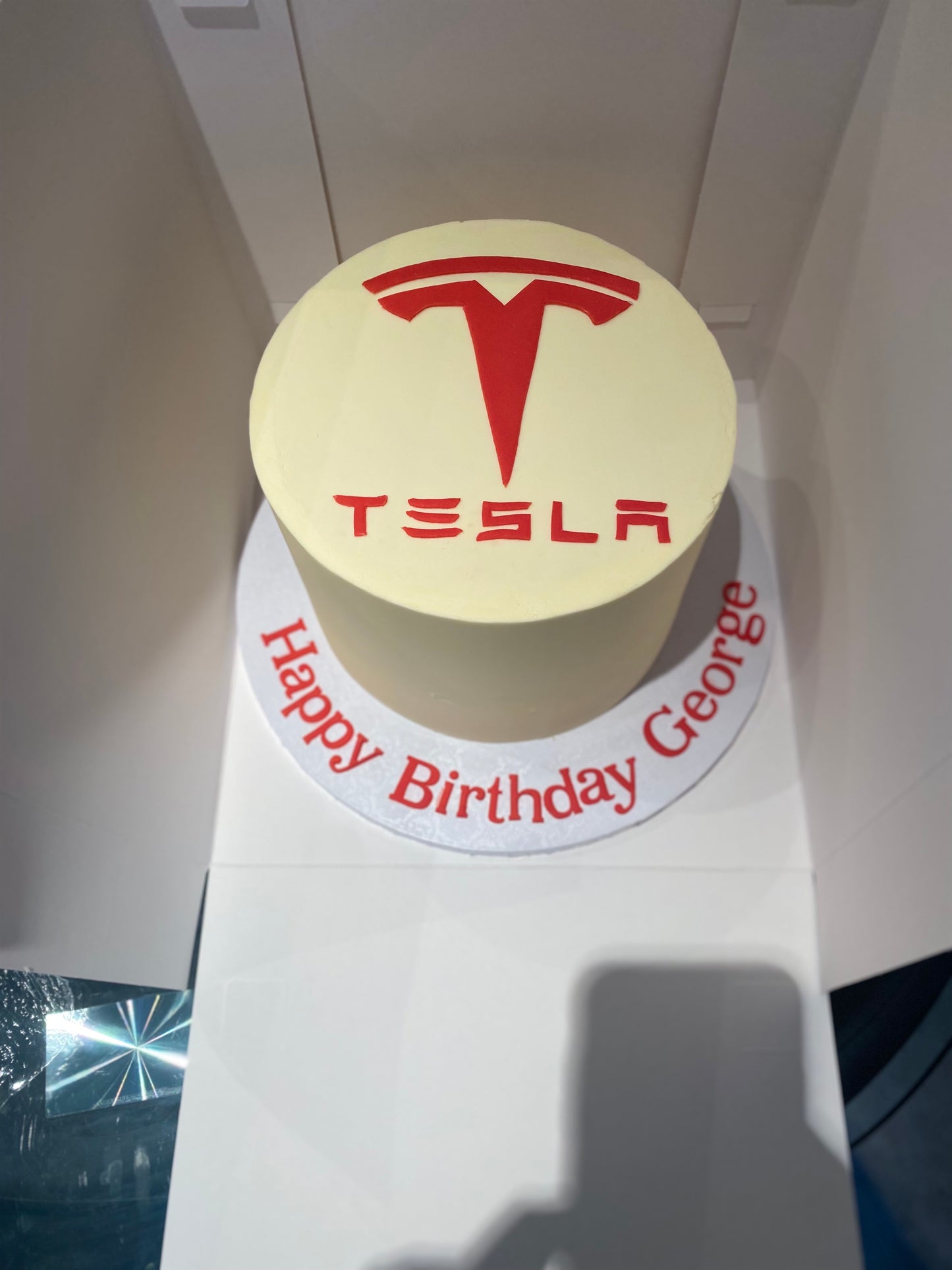 Tesla logo cake