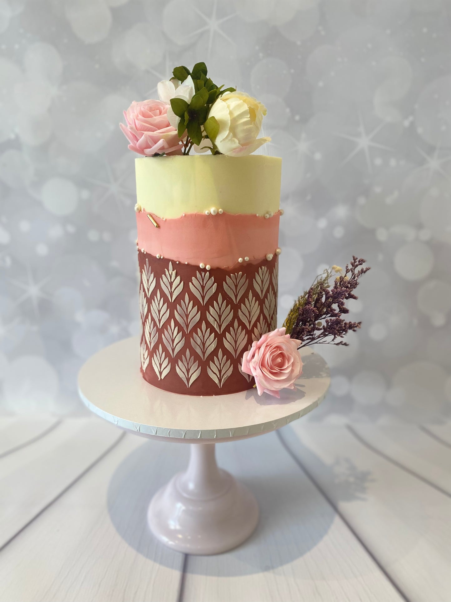 Aubergine and pine ombré stencil cake