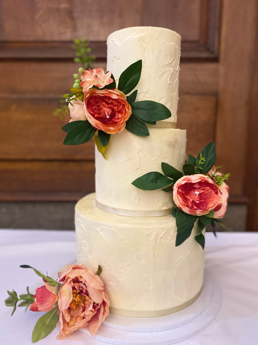 Three-tier rustic buttercream wedding cake