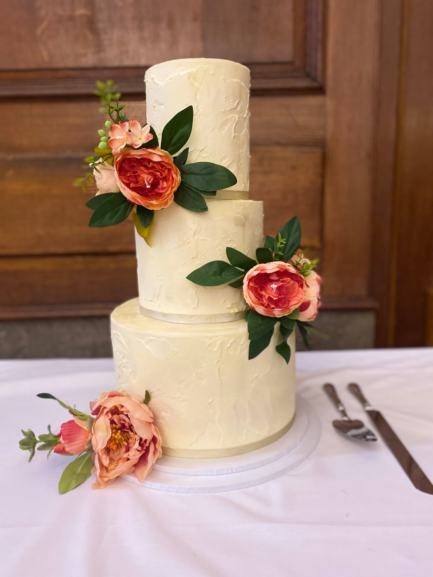 Three-tier rustic buttercream wedding cake